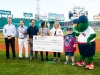 New Hampshire Day impact honorees are presented a check during pre-game at Fenway Park in Boston, Massachusetts Thursday, July 26, 2018.